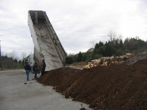 A load of turkey litter being delivered for use in test burn for Xcel Energy